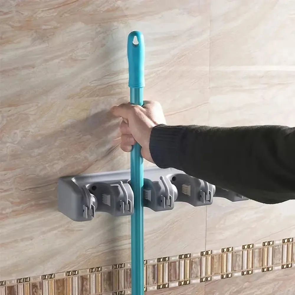 Wall mounted mop holder holder