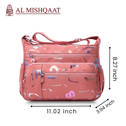 Large stylish crossbody alphabet bag in lavender with multicolor letter print, featuring multiple zippered compartments for fashion and versatility.
