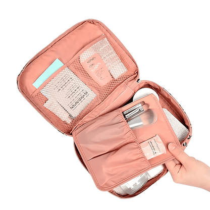 Pink travel organizer with compartments 