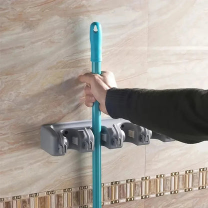 Wall mounted mop holder holder