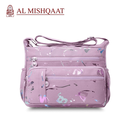 Large stylish crossbody alphabet bag in lavender with multicolor letter print, featuring multiple zippered compartments for fashion and versatility.

