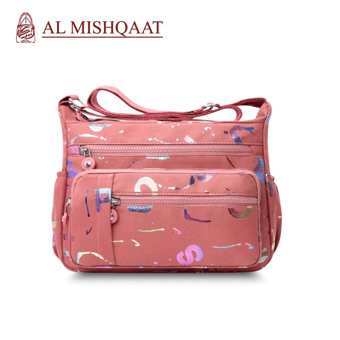 Large stylish crossbody alphabet bag in lavender with multicolor letter print, featuring multiple zippered compartments for fashion and versatility.

