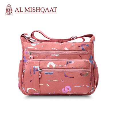 Large stylish crossbody alphabet bag in lavender with multicolor letter print, featuring multiple zippered compartments for fashion and versatility.
