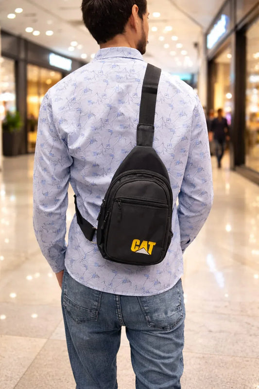 Men's travel sling bag by AL MISHQAAT - HOME & FASHION, showing a compact, stylish sling bag with adjustable strap and multiple compartments.